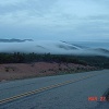 Clouds rolling over the hill